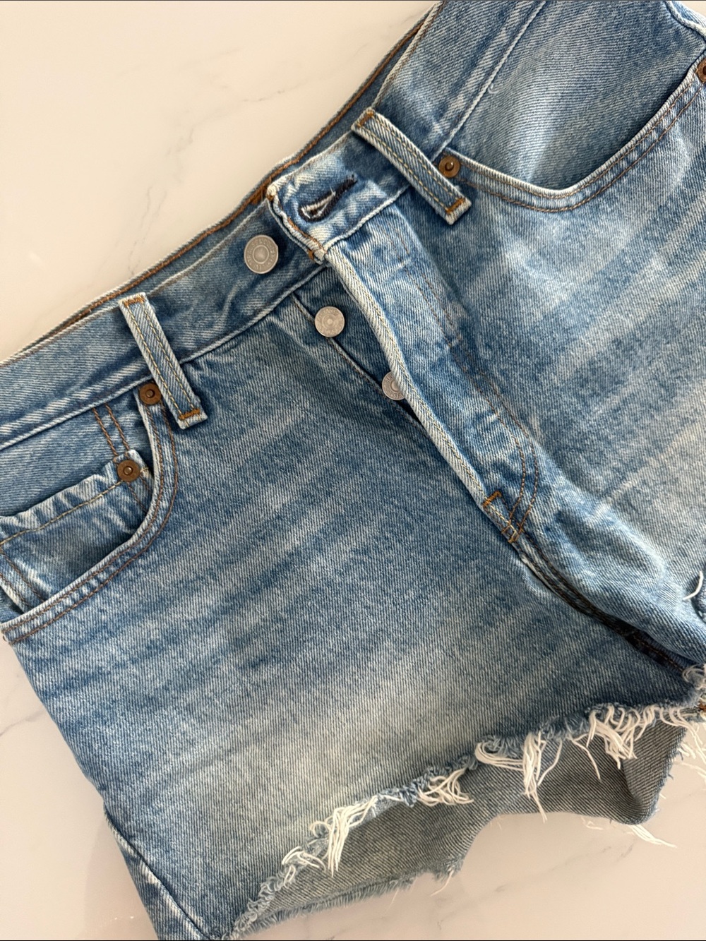 Levi's Light Blue Denim Shorts with Tan Leather Patch